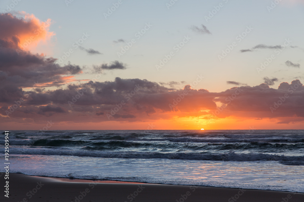 Vibrant beach sunrise