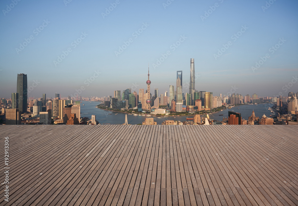 Empty wood floor with city landmark buildings of Shanghai Skyline Empty wood floor with city landmark buildings of Shanghai Skyline