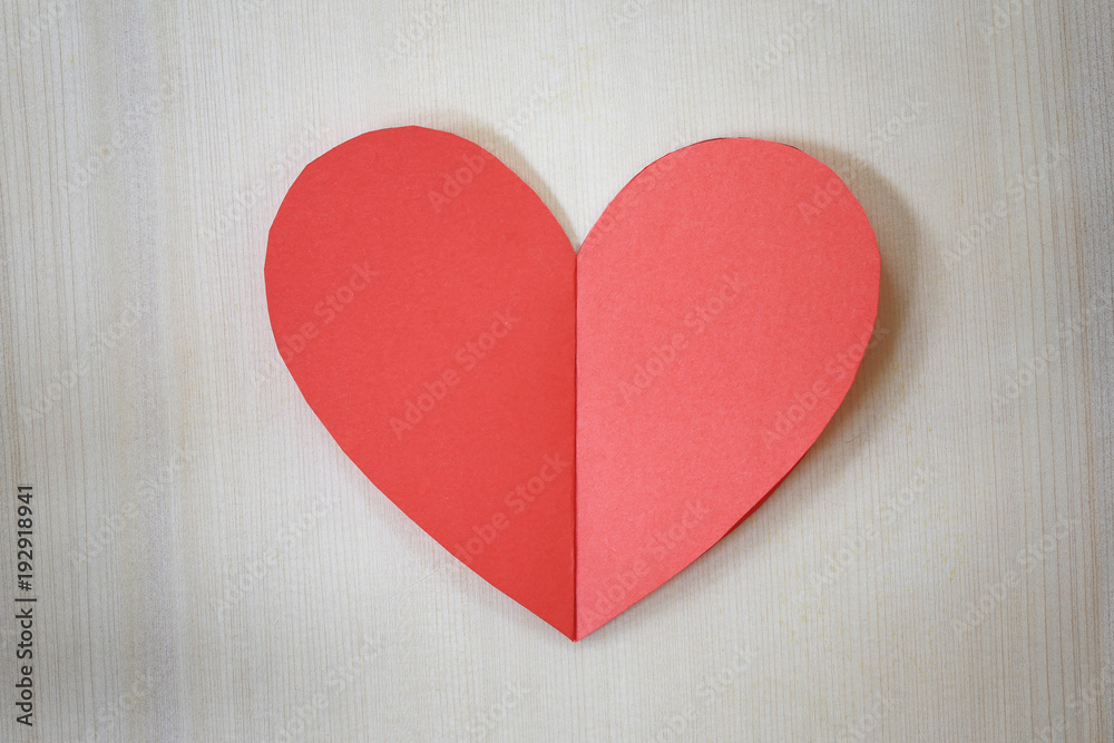 Red paper hearts on the wooden floor. Red paper hearts on the wooden floor.