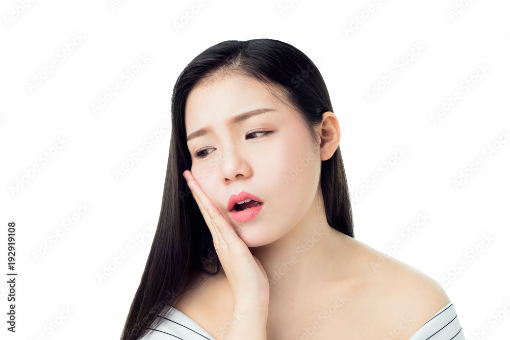 Asian girl in white casual dress Show off the toothache, Maybe because of not maintaining good oral health. on a white background gives a soft light. Asian girl in white casual dress Show off the toothache, Maybe because of not maintaining good oral health. on a white background gives a soft light.