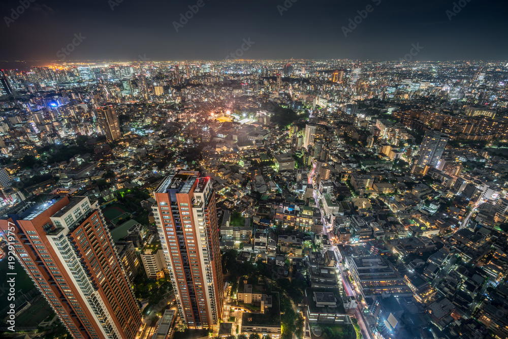 Tokyo - August 08, 2017 : Tokyo skyline night aerial view and highway car trails from Roppongi Hills Mori Tower.