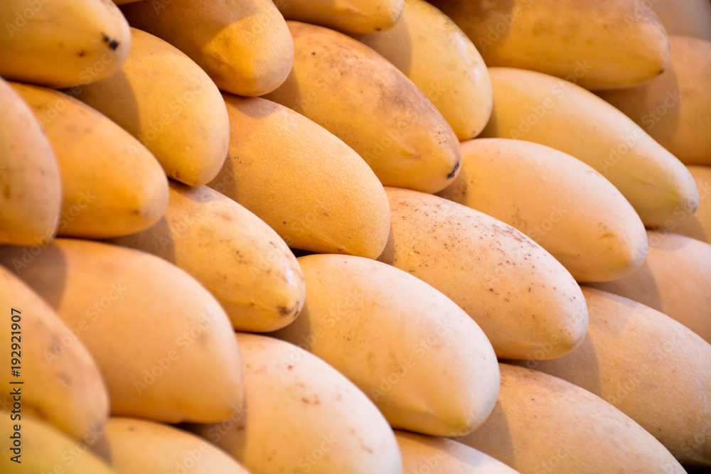background of mangoes on the market in Thailand background of mangoes on the market in Thailand