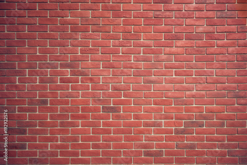 Red brown block brick wall Beautifully arranged texture background