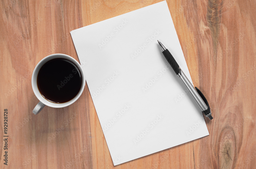 Coffee and clean paper with a pen Coffee and clean paper with a pen