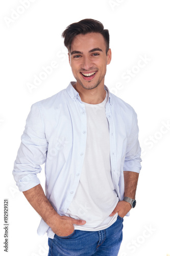 young casual man with hands in pockets is laughing © Viorel Sima