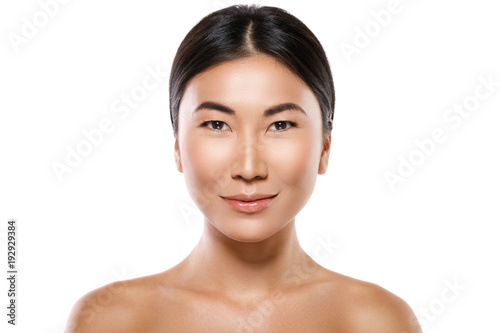 Young and beautiful asian woman on white background