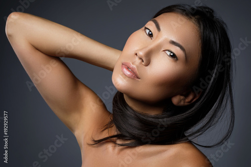 Beautiful asian woman with a black healthy hair
