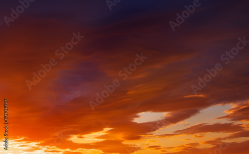 Fototapeta Naklejka Na Ścianę i Meble -  Fiery, orange and red colors sunset sky. Beautiful background