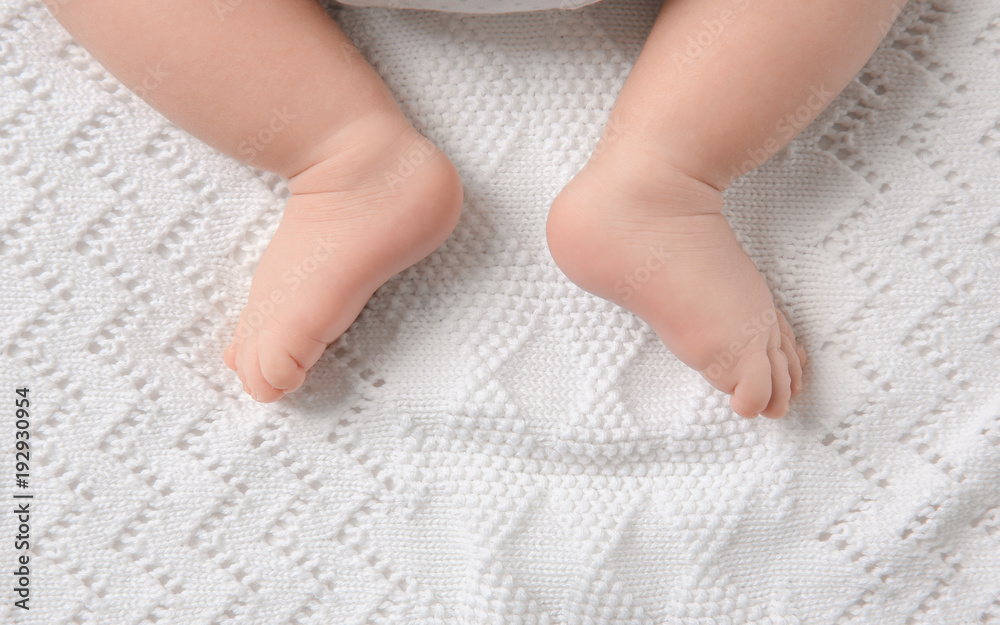 Baby feet on soft blanket Baby feet on soft blanket