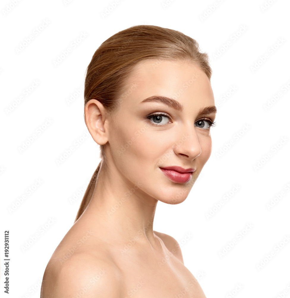 Portrait of beautiful young woman with clear skin on white background