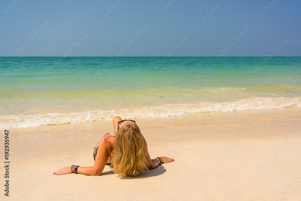 woman resting at the tropical Thailand Railay beach woman resting at the tropical Thailand Railay beach
