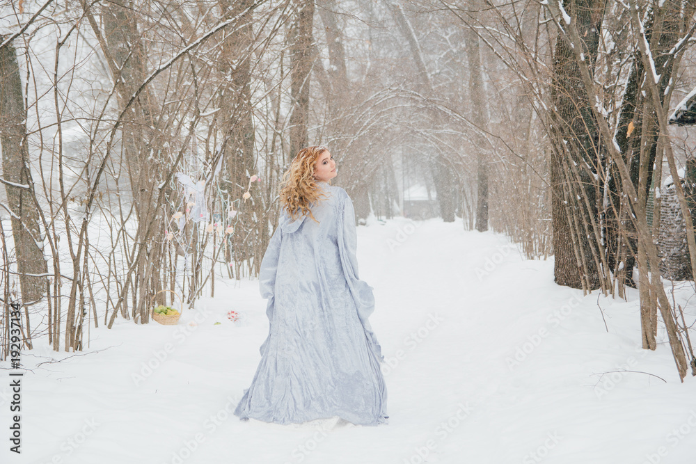 Beautiful girl under the snowfall Beautiful girl under the snowfall