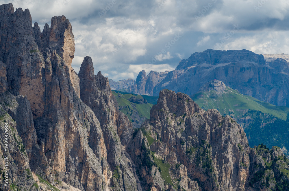 Scenic view of Dolomites Marmolada, Passo Pordoi, near Canazei of Val di Fassa, Trentino-Alto-Adige region, Italy. Rocks and tombs Scenic view of Dolomites Marmolada, Passo Pordoi, near Canazei of Val di Fassa, Trentino-Alto-Adige region, Italy. Rocks and tombs