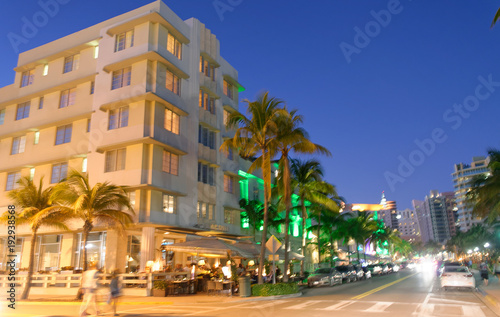 MIAMI - FEBRUARY 25, 2016: Tourists along Ocean Drive on a beautiful winter night. Miami Beach is a famous tourist attraction © jovannig