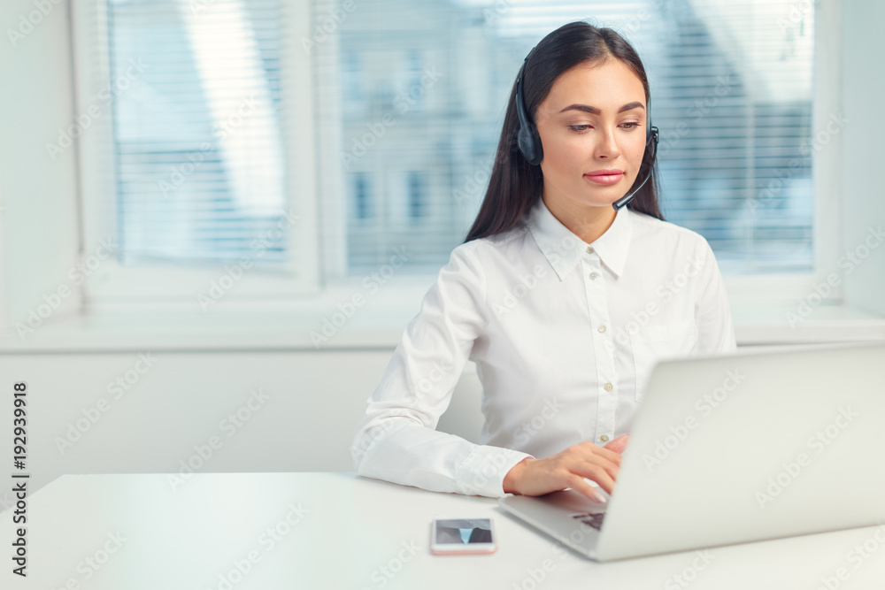 Support phone operator in headset at workplace Support phone operator in headset at workplace