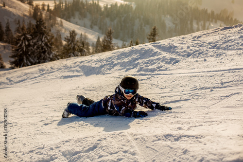Cute preschool child  boy  skiing happily in Austrian Apls