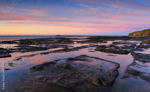 Tidal reflections beach coast Geroa Australia photo