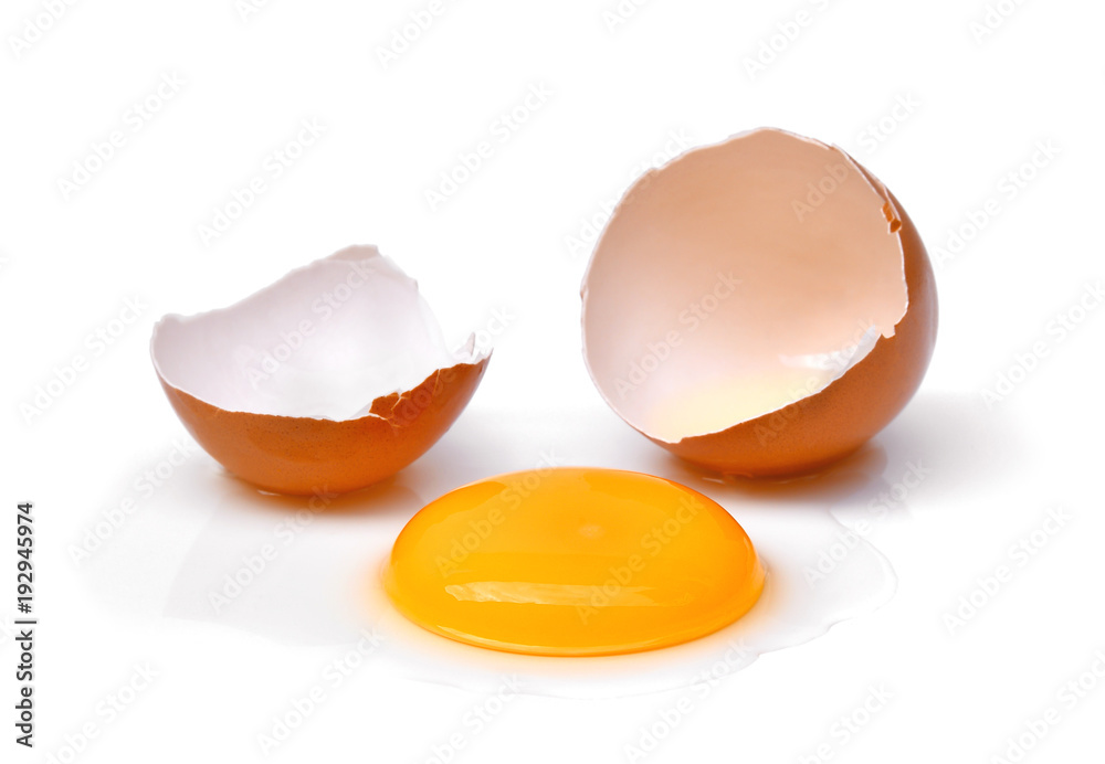 cracked egg with egg shell, egg yolk and egg white isolated on white background cracked egg with egg shell, egg yolk and egg white isolated on white background