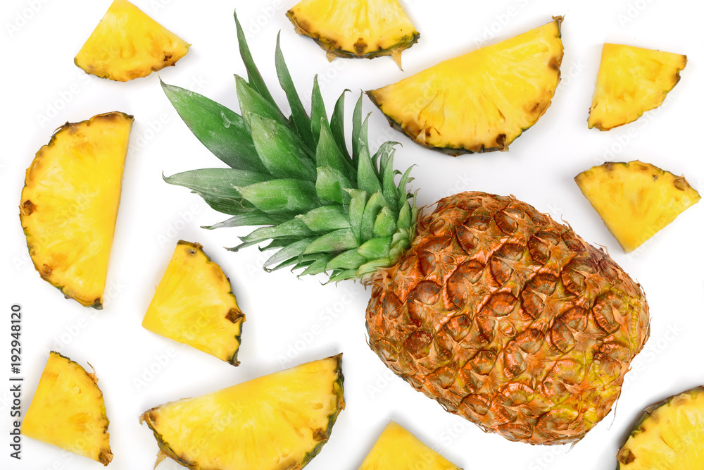 Sliced pineapple isolated on white background. Top view. Flat lay pattern Sliced pineapple isolated on white background. Top view. Flat lay pattern