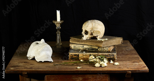 Classical Baroque Still-life in Vantias style with Skull and Death-Mask on a black Background