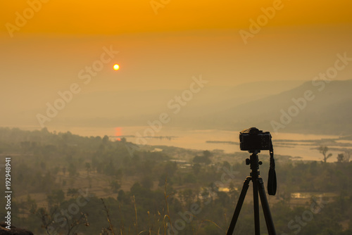 Mirrorless camera at Sunrise, Pha Taem National Park, Thailand photo