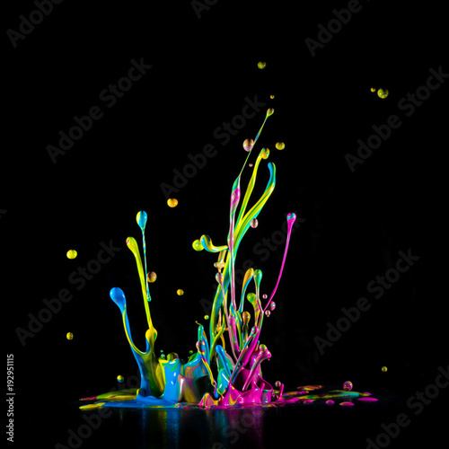 Colour paint splashes isolated on black background