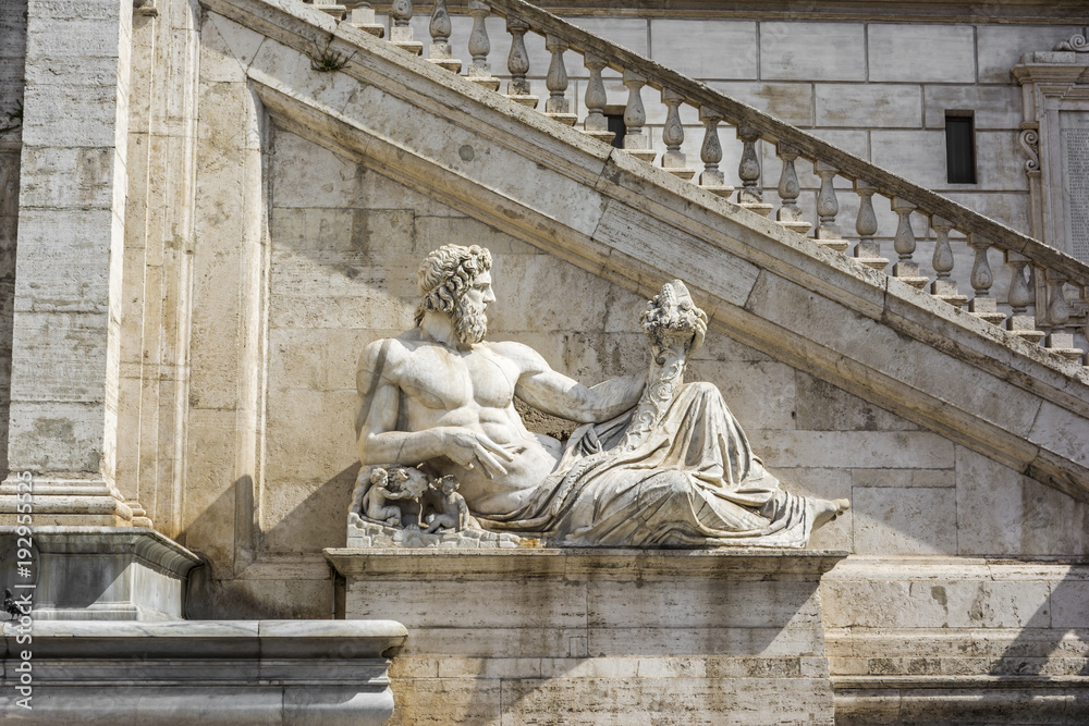 Sculpture in front of stairs of Palazzo Senatorio at Piazza del Campidoglio, Rome, Italy