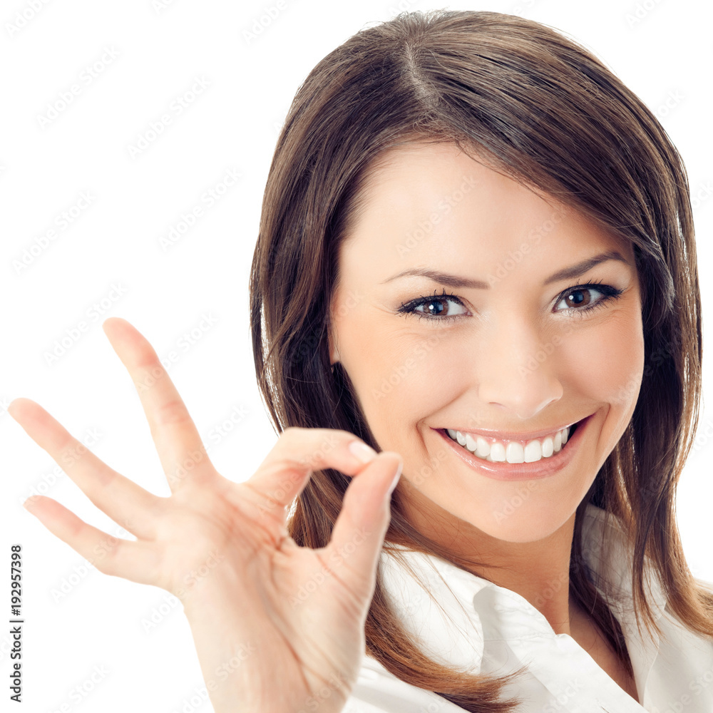 Portrait of happy smiling businesswoman with okay gesture, isolated on white background Portrait of happy smiling businesswoman with okay gesture, isolated on white background