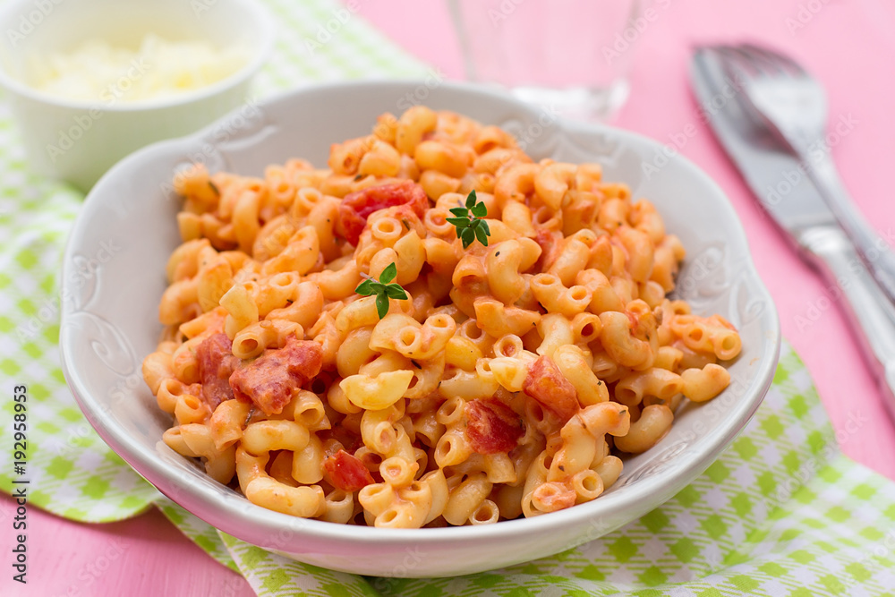 Pasta macaronis stortini coquillettes with tomato and cheese sauce