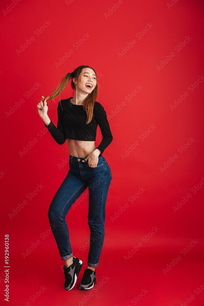 Young cute woman standing isolated