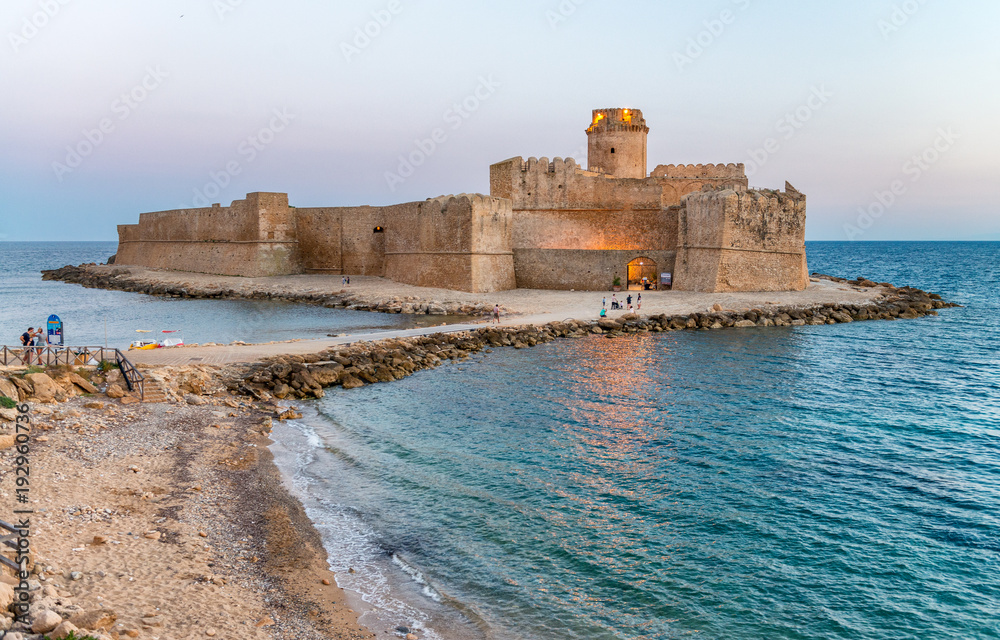 Aerial view of Aragonese Fortress at sunset, Calabria, Italy