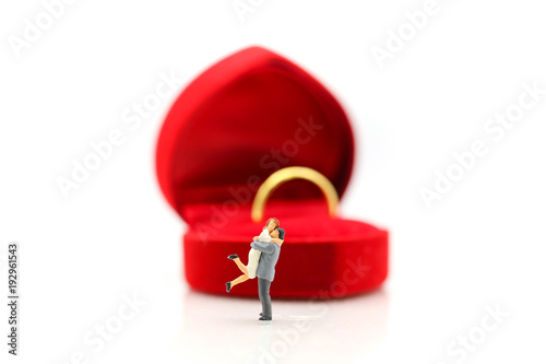 Miniature people : Couple of love with gold ring , love, valentine day concept. © keatikun