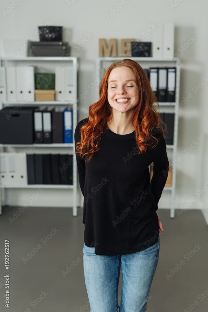 Cute redhead woman with a beaming smile Cute redhead woman with a beaming smile