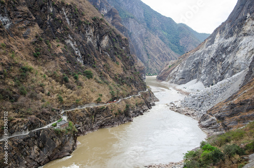 The torrential flow through the hills in Tibet