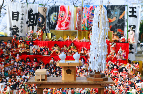 Japanese dolls & ritual articles set displaying on tiered stand during the Grand Bonfire Ceremony of farewell memorial service of old, used dolls at the Japan Shinto shrine Close up, Magnified image 4