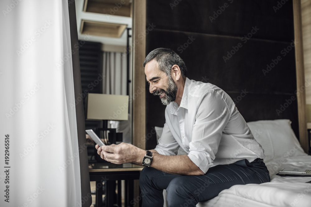 © LStockStudio - Businessman Holding Tablet © LStockStudio - Businessman Holding Tablet