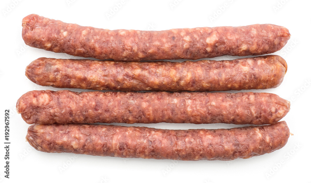 Hungarian dry sausages pepperoni top view isolated on white background four smoked in natural casing mixed pork and beef. Hungarian dry sausages pepperoni top view isolated on white background four smoked in natural casing mixed pork and beef.