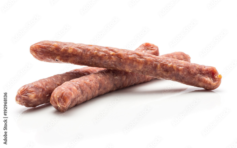 Three Hungarian dry sausages pepperoni isolated on white background smoked in natural casing mixed pork beef. Three Hungarian dry sausages pepperoni isolated on white background smoked in natural casing mixed pork beef.