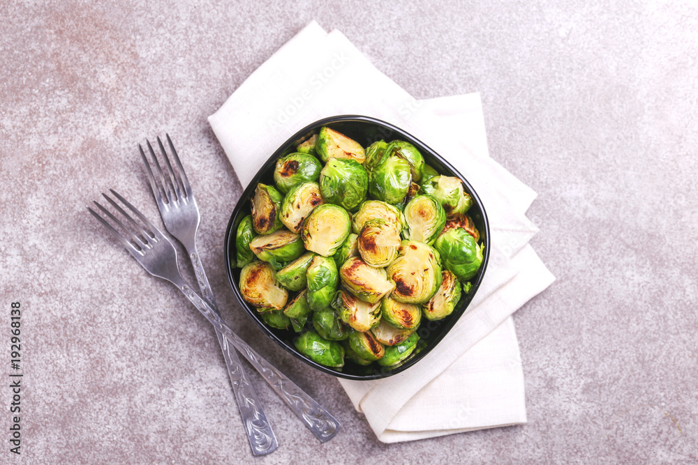 Vegetarian cuisine. Brussels Sprouts roasted with olive oil. Copyspace Vegetarian cuisine. Brussels Sprouts roasted with olive oil. Copyspace