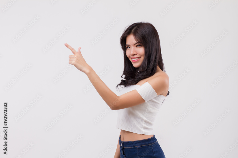 happy smiling woman pointing up portrait, positive optimistic woman point finger or hand studio white isolated portrait, young adult beautiful girl asian woman model happy smiling woman pointing up portrait, positive optimistic woman point finger or hand studio white isolated portrait, young adult beautiful girl asian woman model