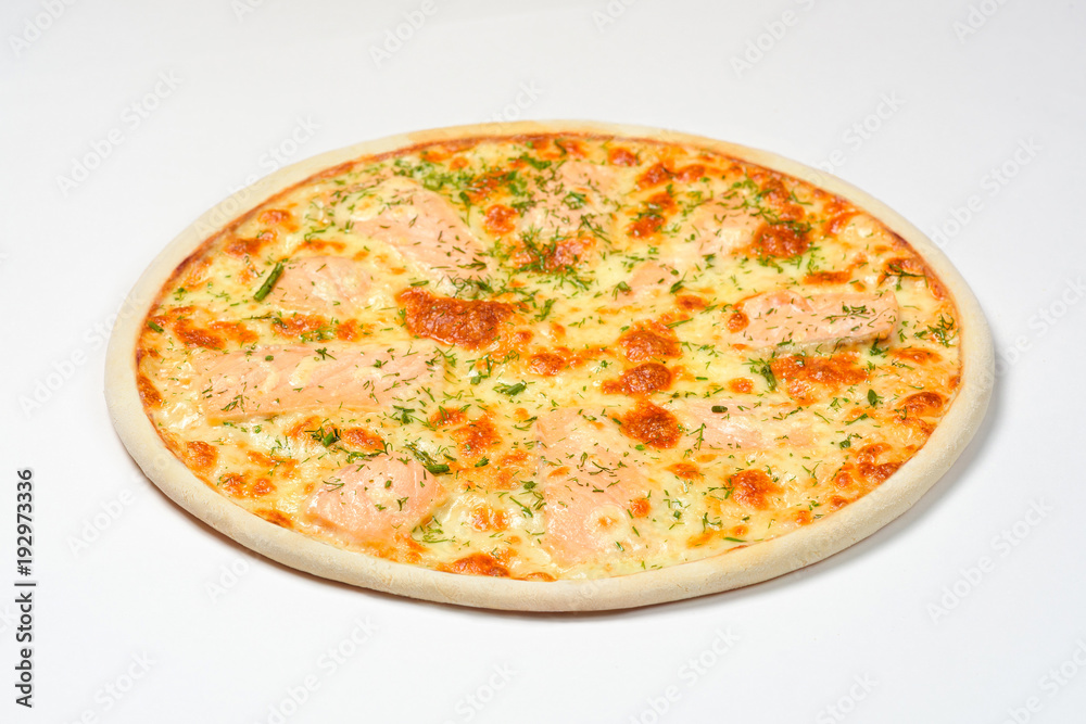Pizza with smoked salmon, greens and mozzarella on a white background