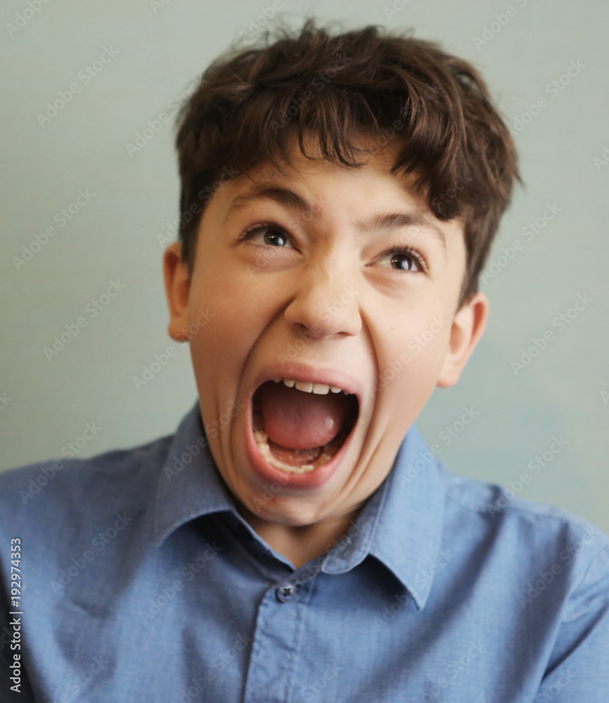 teenager boy scream grimace expression teenager boy scream grimace expression
