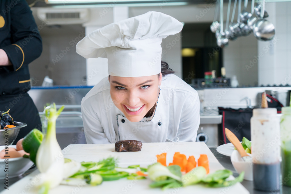 Chef Cooking, Cutting and preparing next plate Chef Cooking, Cutting and preparing next plate