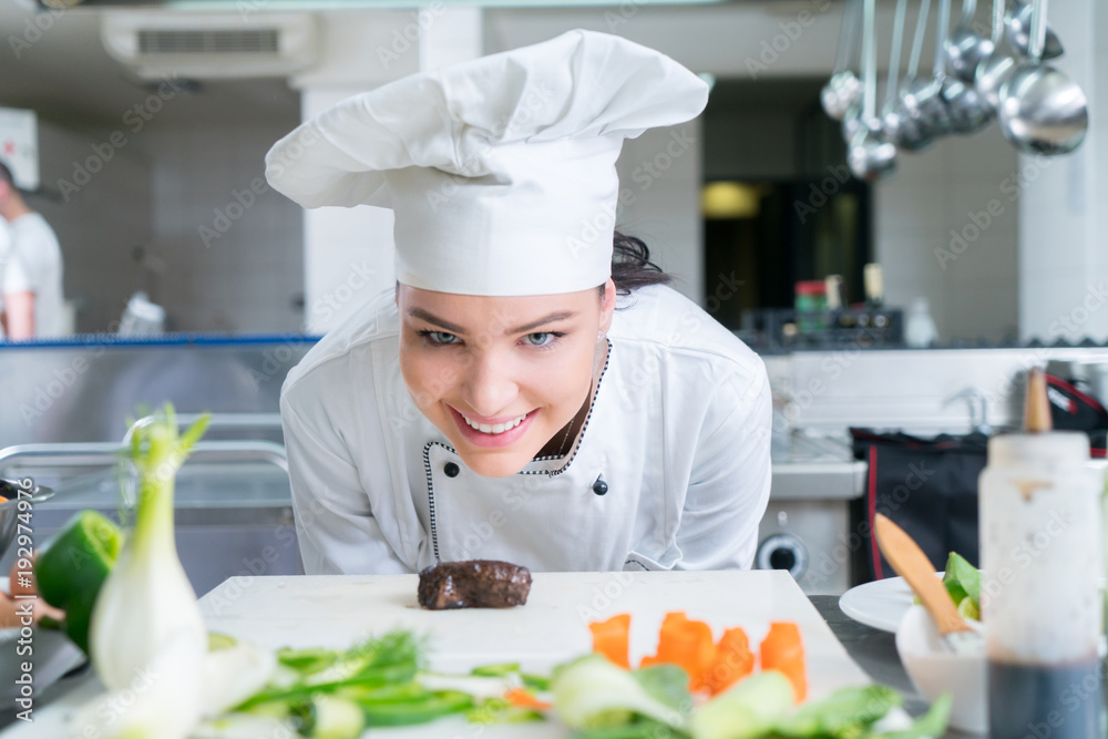 Chef Cooking, Cutting and preparing next plate Chef Cooking, Cutting and preparing next plate