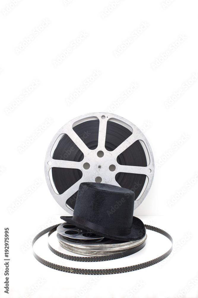 Obraz premium film reels of old movies and black hat