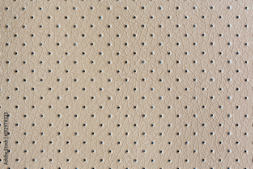 Beige perforated eco leather photo