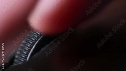 Moving computer mouse wheel. Extreme close up