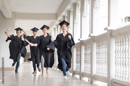Graduation day, Images of Happily graduates are celebrating graduation, graduate are running to their family, Happiness feeling, Commencement day, Congratulation. Education Concept.