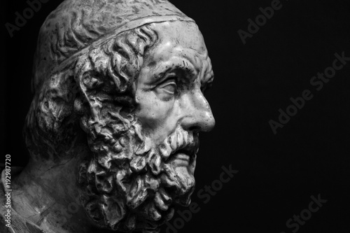 Head and shoulders detail of the ancient sculpture