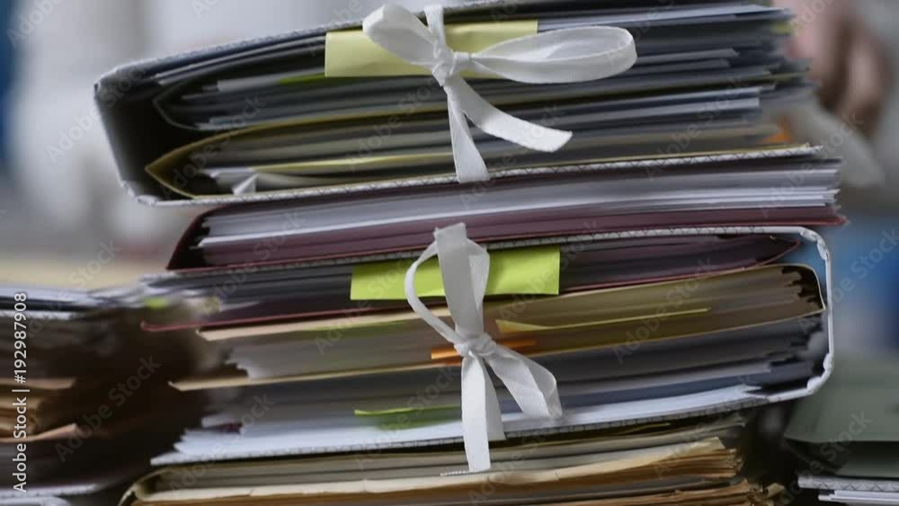 Work overload and stacks of paperwork Work overload and stacks of paperwork